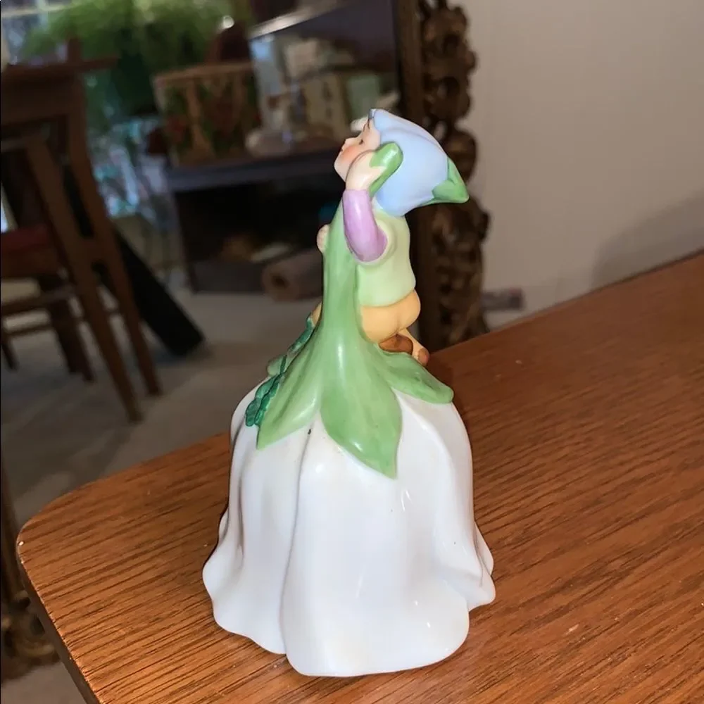 Vtg  1983 Avon porcelain elf bell‎